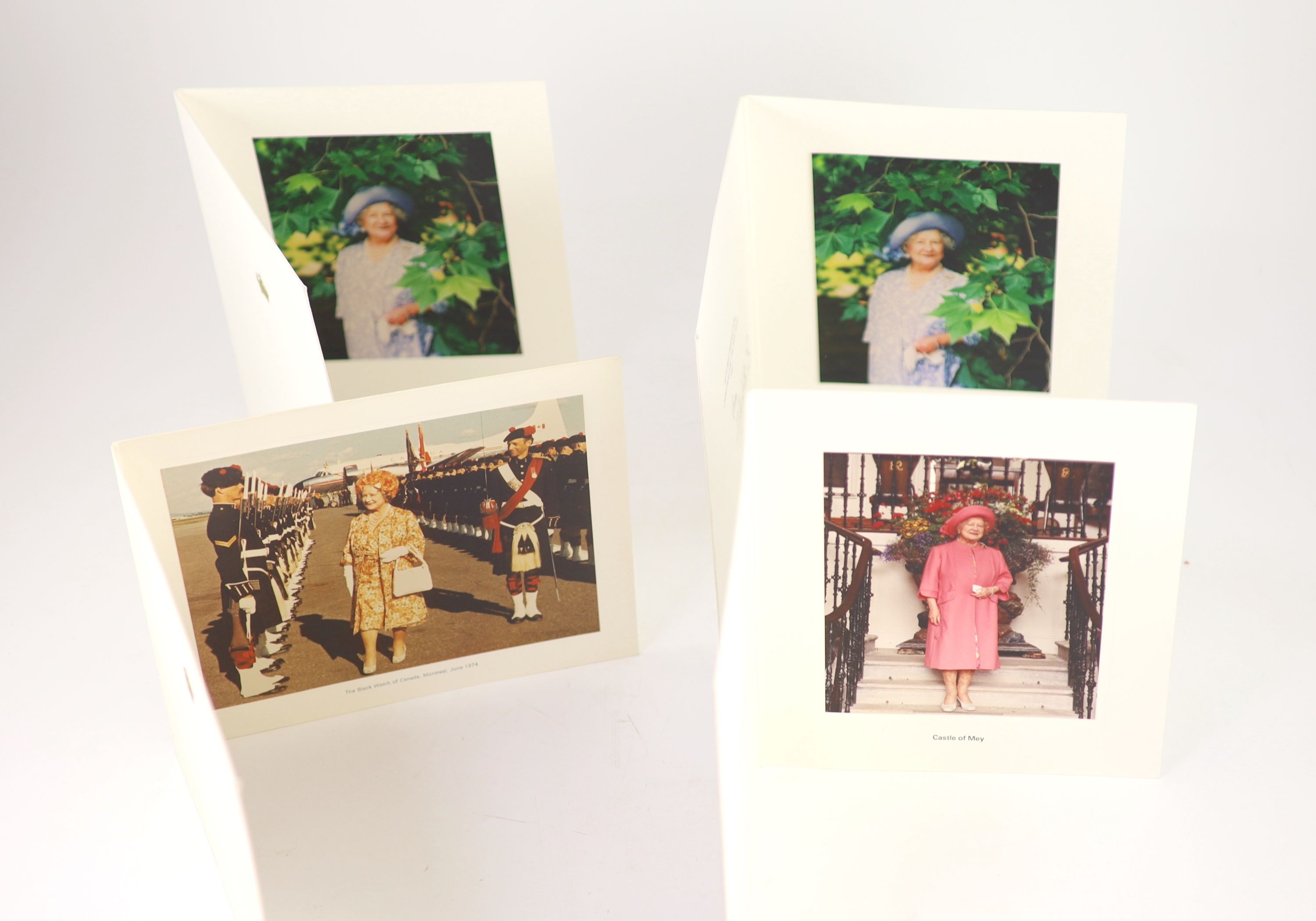 Elizabeth, Queen of George VI of England - 2 colour photographs, sent as Christmas cards for the years 1995 and 2000, each signed ‘’Elizabeth R’’, together with 2 others, unsigned, for the years 1974 and 1995 and 2 furth